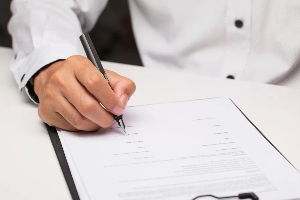 Image of a person writing on Private Certification in Byron Bay